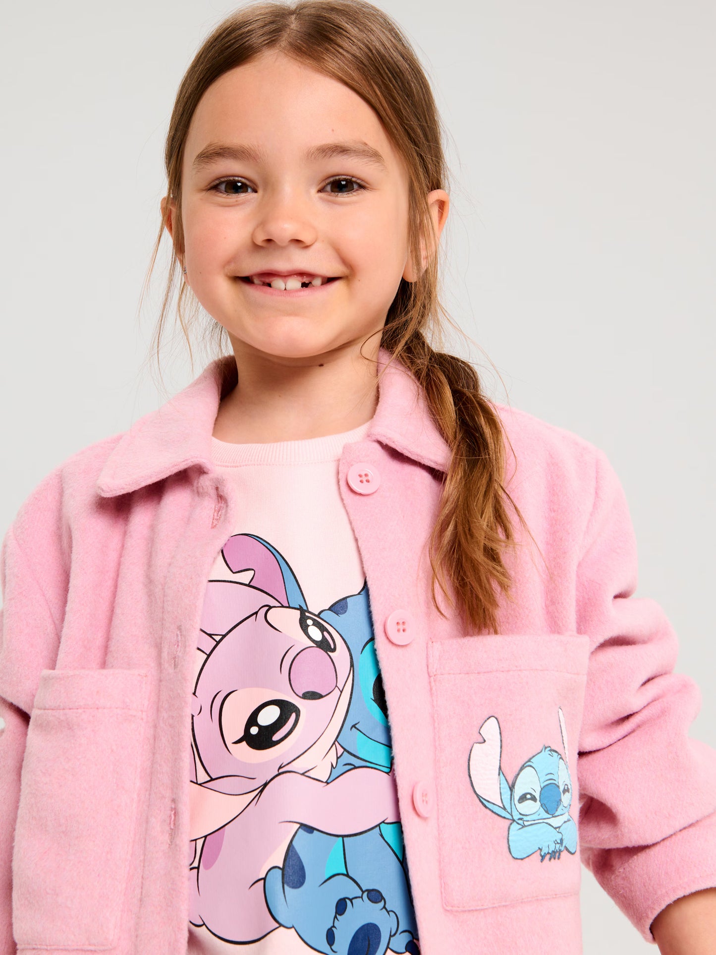 Veste chaude stitch rose